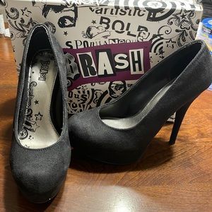 Woman’s black suede size 8 heel